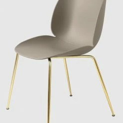 Gubi Beetle Dining Chair Unupholstered Brass Base -vitra shop beetle diningchair conic unupholstered brass newbeige front a9eea989 a6a6 40c9 ba74 fc7d49dc3a51 1024x1024 2
