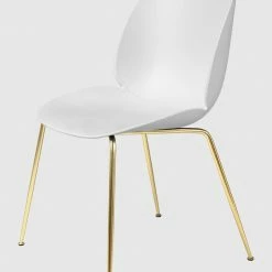 Gubi Beetle Dining Chair Unupholstered Brass Base -vitra shop beetle diningchair conic unupholstered brass white front 09d9afa7 6398 4f01 8810 71b62dd32a1a 1024x1024 2