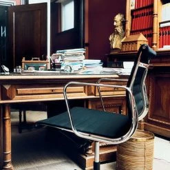 Vitra Eames EA 117 Office Chair -vitra shop vitra ea 117 aluminium chair in black leather lifestyle view